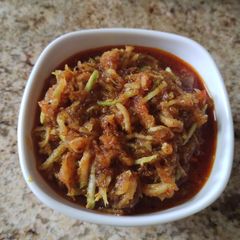 A picture of Onion and raw mango instant pickle.