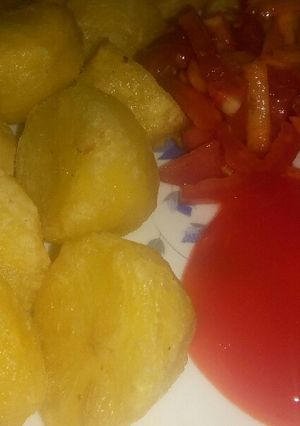 A picture of Fried potatoes with carrot and tomato salad #allstarcontest.