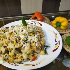 A picture of Pasta with cheese.