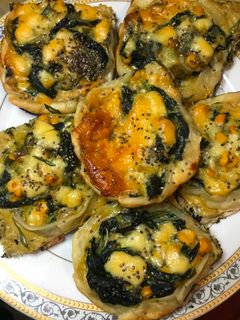 Una foto de Canastitas de espinaca y queso