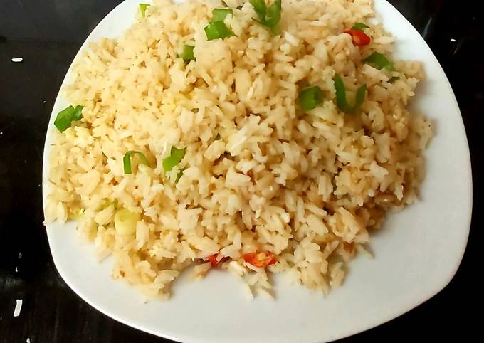 How to Prepare Favorite Spicy hot Egg Fried Rice. 🥰