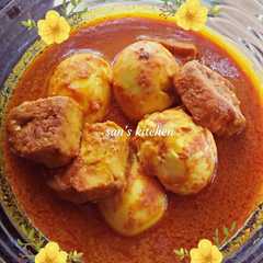 A picture of Tahu telur masak santan pedas.
