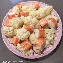 A picture of Cauliflower Sauteed with Crab Stick.