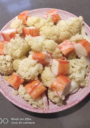 A picture of Cauliflower Sauteed with Crab Stick.