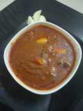 Onion Garlic Kuzhambu (Poondu Kuzhambu): A Flavorful Delight for Hot Rice