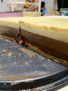 Una foto de Tarta 3 chocolates 🍫