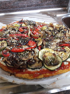 Una foto de Pizza vegana