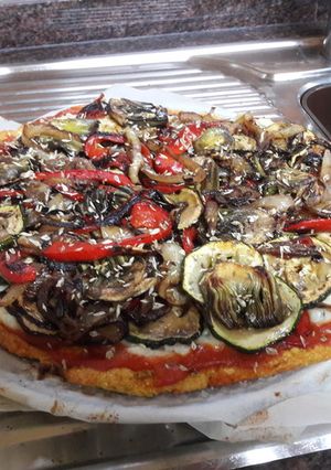 Una foto de Pizza vegana