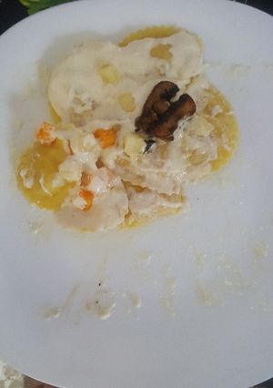 Foto principal de Raviolis rellenos de parmigiano y trufa y de queso