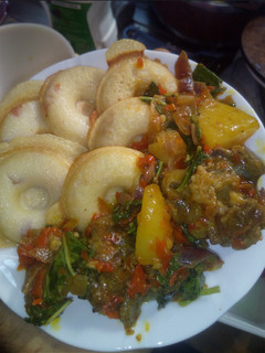 A picture of ..Semovita Masa with vegetable sauce.