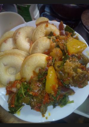 A picture of ..Semovita Masa with vegetable sauce.