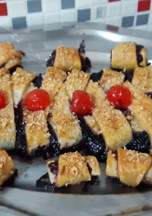Una foto de Trenza de hojaldre de chocolate y frutos rojos. Sin gluten