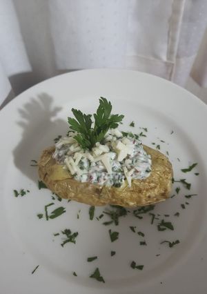 Una foto de Papa horneada a la mozzarella