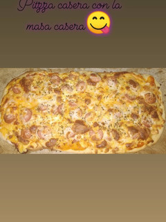 Una foto de Pizza casera con la Masacasera