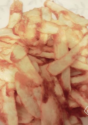 Una foto de Papitas crocantes 🍟🥤