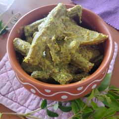 A picture of Drumsticks in a mustard gravy(sorisho bata muniga) local name.