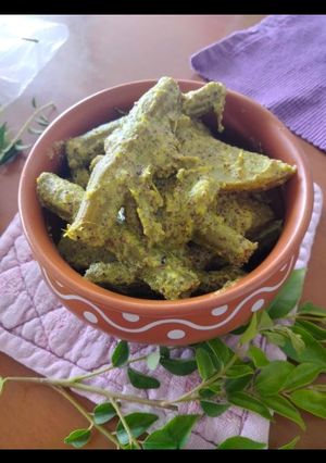 A picture of Drumsticks in a mustard gravy(sorisho bata muniga) local name.