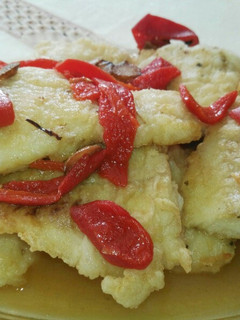 Una foto de Merluza con pimientos