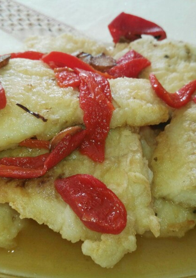 Una foto de Merluza con pimientos