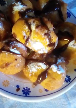 Una foto de Buñuelos de naranja c/chocolate🍊🍫