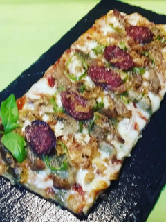 Una foto de Pizza secreto