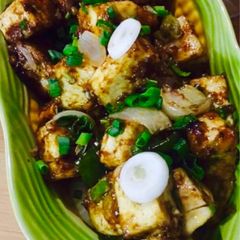 A picture of Paneer chilli dry.