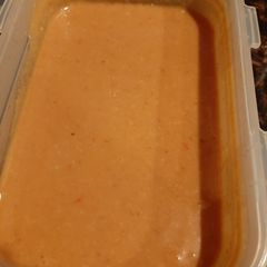 A picture of Pureed pinto beans and ham.
