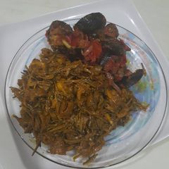 A picture of Ugba with snails.