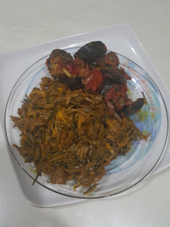 A picture of Ugba with snails.