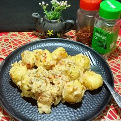 A picture of Cheesy Garlic Potato.
