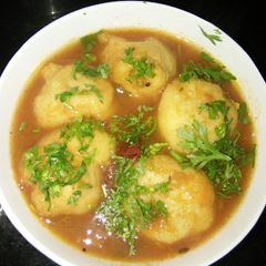 A picture of Rasam vada.
