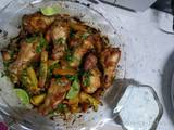 Spicy chicken wings sweet potato wedges coriander n lime yogurt