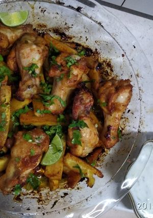 A picture of Spicy chicken wings sweet potato wedges coriander n lime yogurt.