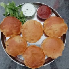A picture of Sweet Potato Poori.