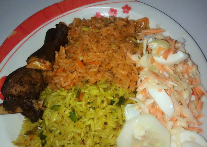 Fried and jollof rice combo garnished with coleslaw