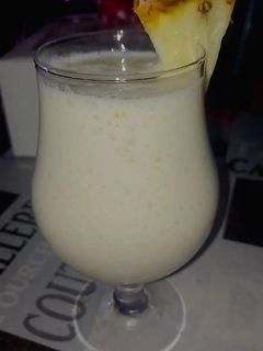 Una foto de Licuado de piña banana y manzana