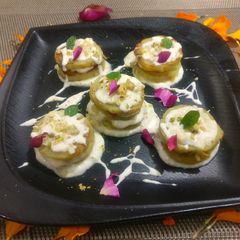 A picture of Sweet potatoes in hung curd & milkmaid.