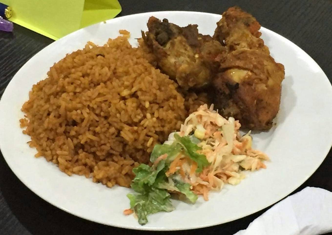 Jollof rice,fried chicken and coleslaw
