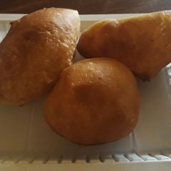 A picture of Mahamri ya iliki na tui la nazi #4wkschallenge#charityrecipe#.