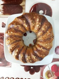 Una foto de Bizcocho de plátano, dátiles y ralladura de naranja