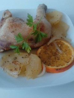 Una foto de Pollo asado con Naranja