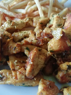 Una foto de Pollo Ras el Hanout