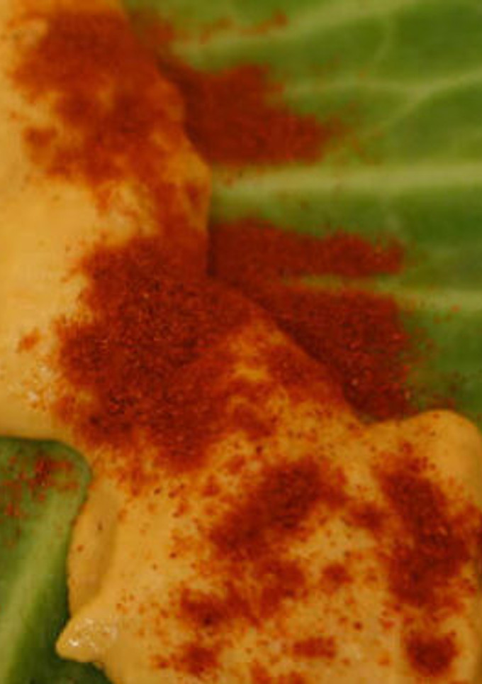 Una foto de Hummus de pimiento rojo