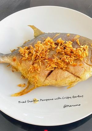 A picture of Fried Shortfin Pompano with Crispy Garlics.