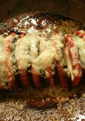Foto principal de Rollo de berenjena, tomate y queso gratinado