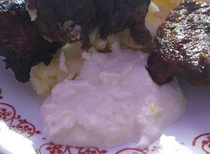 O poză a rețetei Carne de porc la cuptor cu sos de hrean.