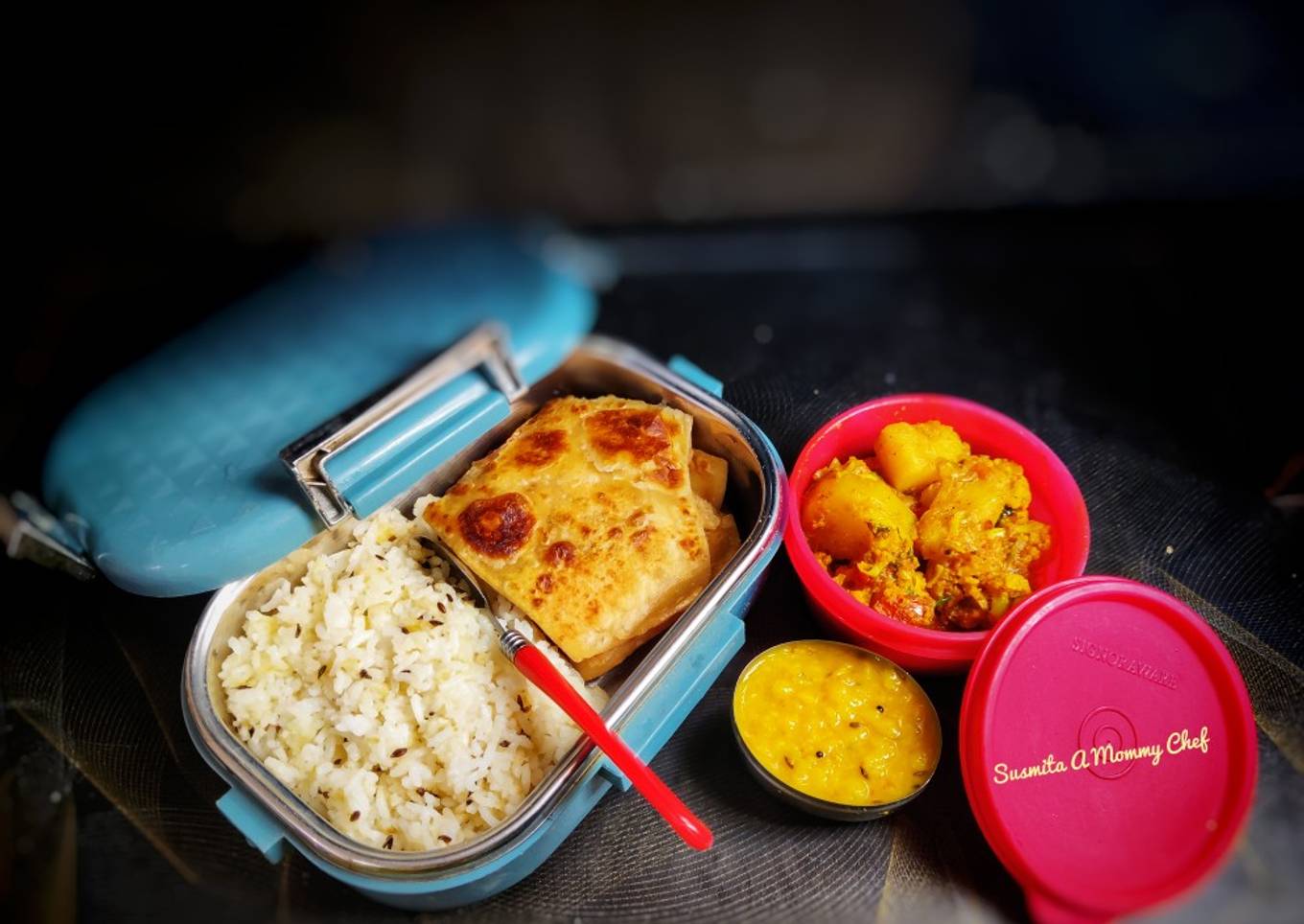 Lunch box (Jeera rice,ajwain paratha, pili dal, gobhi aloo sabzi