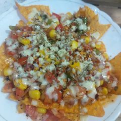 A picture of Salsa cheesy nachos 😋.