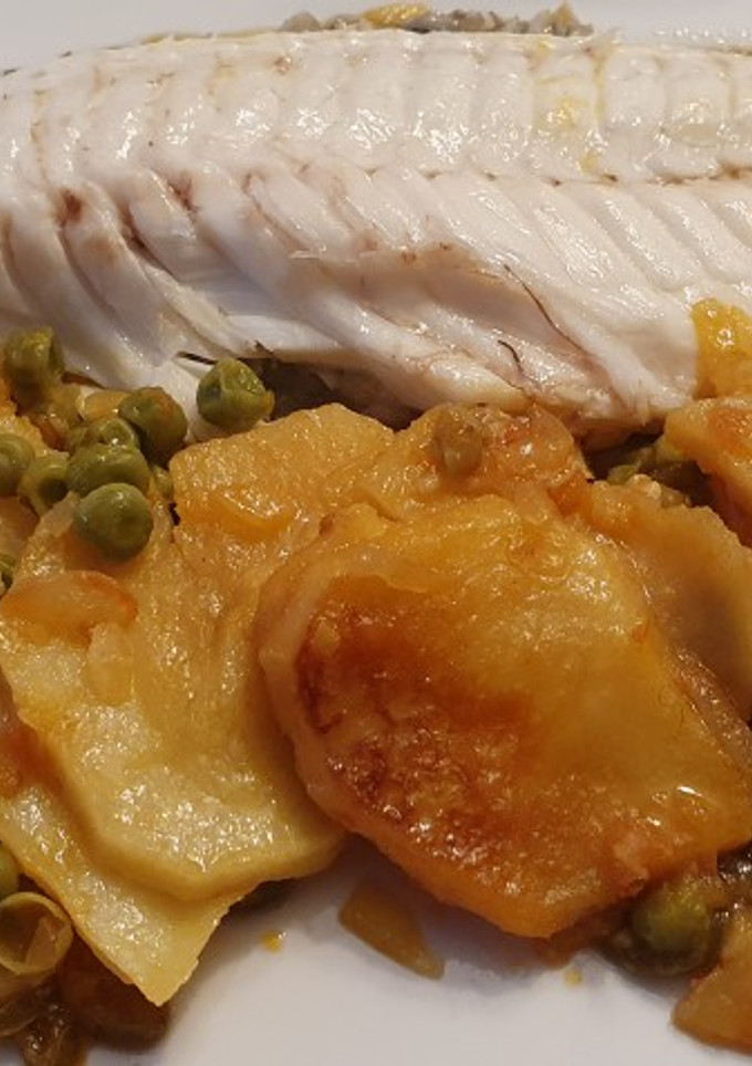 Una foto de Dorada al Albariño