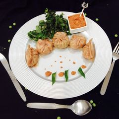 Soya granules stuffing Beetroot Momos A picture of Soya granules stuffing Beetroot Momos.